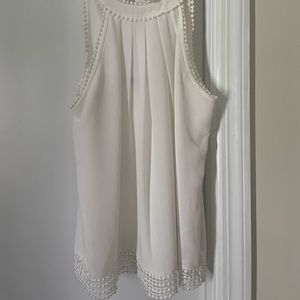 White blouse with bow tie in back